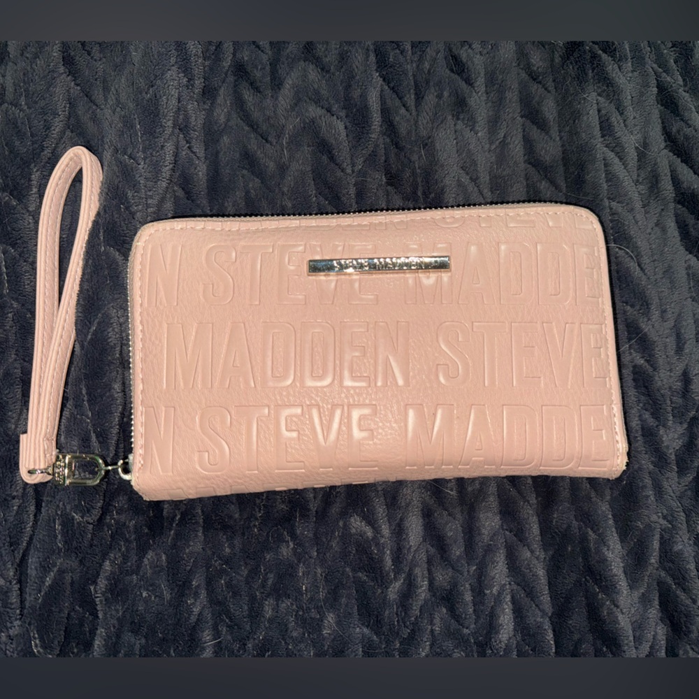 Pink Steve Madden zipper wallet.